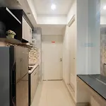 Simply Studio Grand Kamala Lagoon Apartment By Travelio