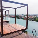 Simply Studio Grand Kamala Lagoon Apartment By Travelio